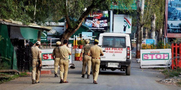 Uri: Special Operation Group of Jammu and Kashmir Police personnel move inside the Army Brigade camp during a terror attack in Uri, Jammu and Kashmir on Sunday. PTI Photo.