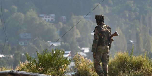 An Army soldier near Army Brigade camp during a terror attack in Uri, Jammu and Kashmir on Sunday.