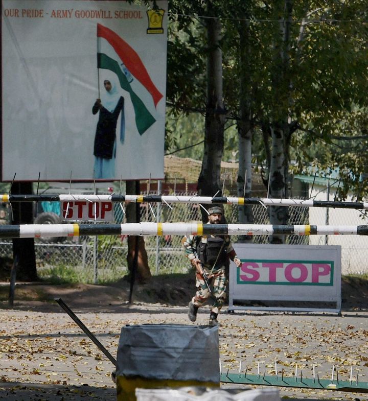 An army soldier in action inside the Army Brigade camp during a terror attack in Uri, Jammu and Kashmir on Sunday.