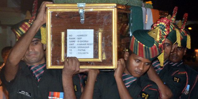 Indian Army Gard of Honor the Bodies of two soldiers killed at Uri to arrive Netaji Subash Chandra Bose International Air Port in Kolkata, India on 19 September 2016.