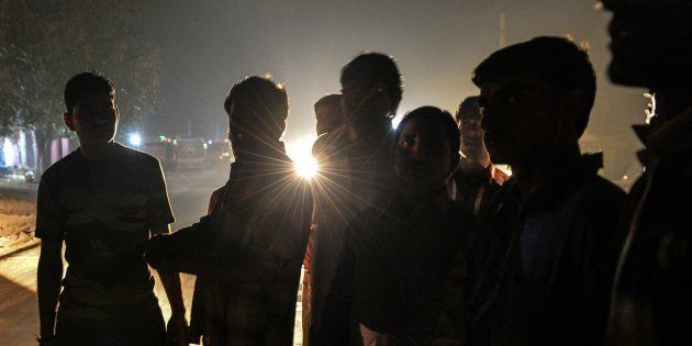 In this photograph taken on November 5, 2015, volunteers of the vigilante group of Gau Raksha Dal wait to inspect trucks on a highway in Rajasthan.