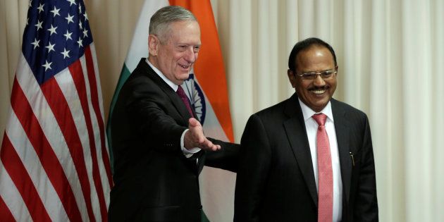 U.S. Defense Secretary James Mattis (L) welcomes Ajit Doval, National Security Advisor of India, before their meeting at the Pentagon in Washington, U.S., March 24, 2017.