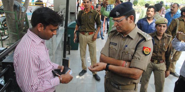 Lucknow Police run an anti-Romeo operation at Saharaganj mall, on March 22, 2017 in Lucknow, India.