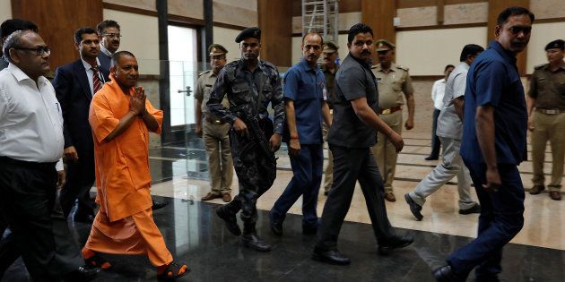 Yogi Adityanath, newly appointed Chief Minister of India's most populous state of Uttar Pradesh, arrives to attend a meeting with government officials at Lok Bhavan in Lucknow.