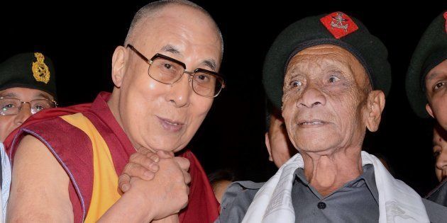 Dalai Lama with Naren Chandra Das, a retired havaldar of 5 Assam Rifles during Namami Brahmaputra festival in Guwahati on Sunday.
