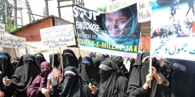 Kashmiri Dukhtaran-e-Millat (Daughters of the Nation) activists demonstrate during a protest in Srinagar on August 17, 2012. The demonstrators protested against sectarian violence on Rohingya Muslims in Myanmar.