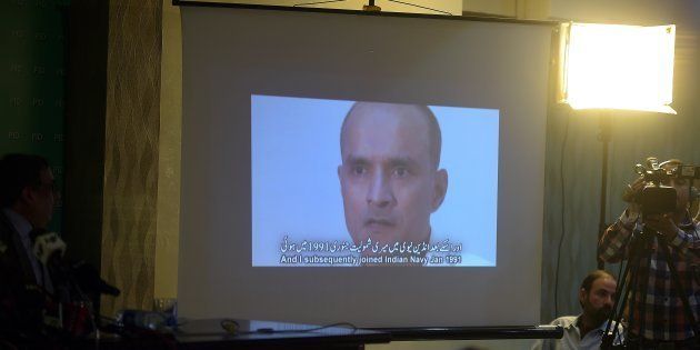 March 29, 2016: Pakistani journalists watch a video showing Indian national Kulbhushan Yadav, arrested on suspicion of spying, during a press conference in Islamabad.