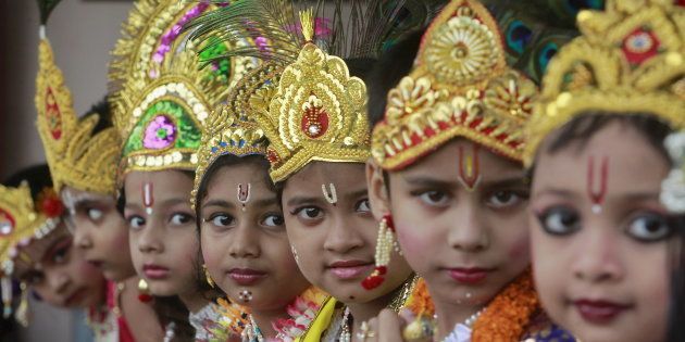 Schoolchildren dressed as Hindu Lord Krishna, wait to perform during the celebrations to mark the Janmashtami festival in Agartala, India, September 5, 2015. The festival, which marks the birth anniversary of Lord Krishna, is being celebrated across the country today. REUTERS/Jayanta Dey