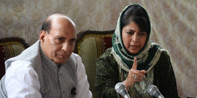 Chief minister of Jammu and Kashmir, Mehbooba Mufti (R) addresses a joint press conference with Indian home minister Rajnath Singh in Srinagar on August 25, 2016.