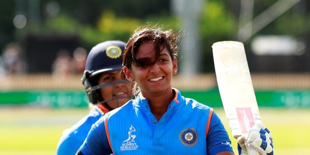 India's Harmanpreet Kaur walks off after scoring 171 not out.