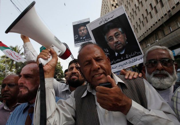 Supporters of former President Pervez Musharraf, head of the All Pakistan Muslim League (APML) political party, chant slogans during a rally to show solidarity with their leader and the Pakistan army, in Karachi April 20, 2014.