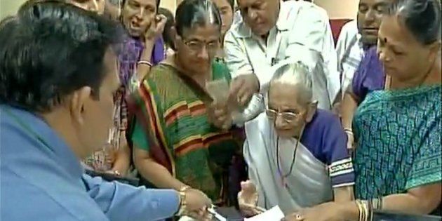 Prime Minister Narendra Modi's mother Heeraben Modi visited a bank in Gandhinagar to exchange old notes.