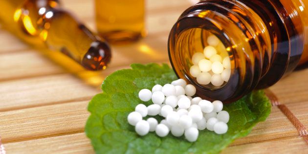 alternative medicine with homeopathy and herbal pills.