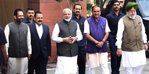 Prime Minster Narendra Modi with Parliament Affairs Minister Anant Kumar, Minister of State for Parliamentary Affairs SS Ahluwalia Mukhtar Abbas Naqvi and Dr. Jitender Singh arrive on the first day of the winter session of Parliament on 16 November 2016 in New Delhi. (Photo by Sonu Mehta/Hindustan Times via Getty Images)