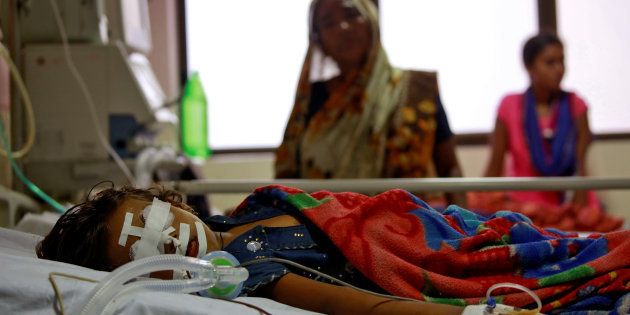 A child is seen in the Intensive care unit in the Baba Raghav Das hospital in Gorakhpur district, India August 13, 2017. REUTERS/Cathal McNaughton