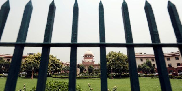 India's Supreme Court is pictured through a gate in New Delhi, India May 26, 2016. REUTERS/Anindito Mukherjee