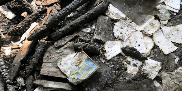 Burnt books inside the gutted building of government school at Gori Pora on October 31, 2016 in Srinagar, India.