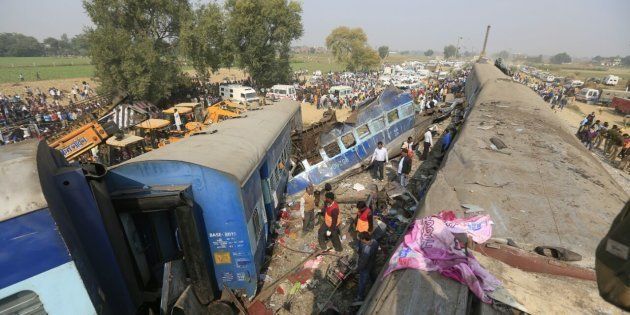 LUCKNOW, INDIA - NOVEMBER 20: A view of a Patna-Indore Express derailed train near Kanpur, Uttar Pradesh, on November 19, 2016 in Lucknow, India. As many as 120 people were killed when 14 coaches of the Patna-Indore Express derailed near Pukhrayan in Kanpur district early on Sunday. A team of at least 90 army personnel from Kanpur has been deployed for rescue and relief operations. Four army doctors, 20 paramedics and two ambulances have also been sent to the accident site. (Photo by Deepak Gupta/Hindustan Times via Getty Images)