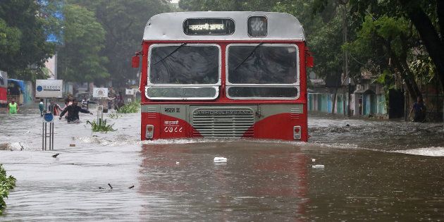 A passenger bus moves through a water-logged road during rains in Mumbai, India, August 29, 2017. REUTERS/Shailesh Andrade