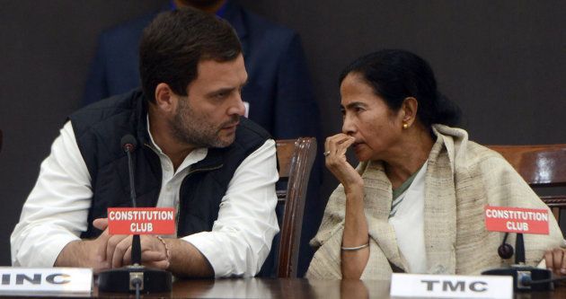 NEW DELHI, INDIA DECEMBER 27: Congress Vice president Rahul Gandhi with West Bengal CM Mamata Banerjee during a joint press conference by the opposition parties against demonetisation at Constitution Club, in New Delhi. (Photo by Parveen Negi/India Today Group/Getty Images)