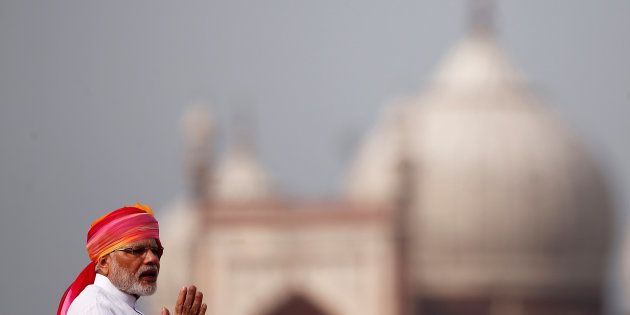 Indian Prime Minister Narendra Modi gestures as he addresses the nation from the historic Red Fort during Independence Day celebrations in Delhi.