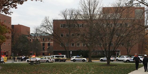 Law enforcement officials are seen outside of a parking garage on the campus of Ohio State University as they respond to an active attack in Columbus, Ohio, on November 28, 2016.Eight people were injured when an attacker apparently drove into a crowd at Ohio State University on Monday, triggering an hours-long lockdown before authorities declared the campus secure. Law enforcement shot and killed one suspect, according to local television station WBNS, which reported that police led two people o