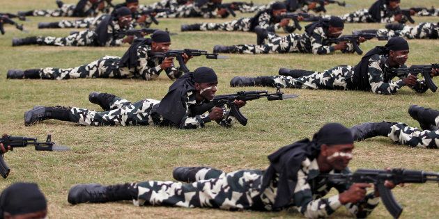 India's Central Reserve Police Force (CRPF) personnel take part in the passing out parade in Humhama, on the outskirts of Srinagar.