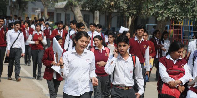 Students coming out after appearing in the first English paper of the class XII CBSE examinations in Gurgaon.