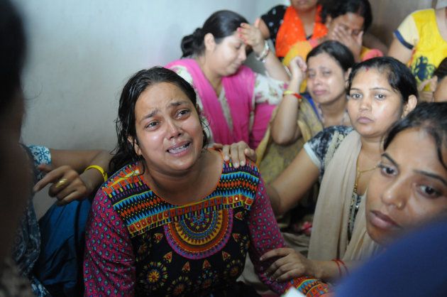 Mother of the seven-year-old child in shock over the murder of her son on September 8, 2017 in Gurgaon, India.