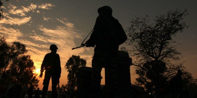 Soldiers patrol on the Jammu-Srinigar National Highway during a combing operation after Nagrota attack.
