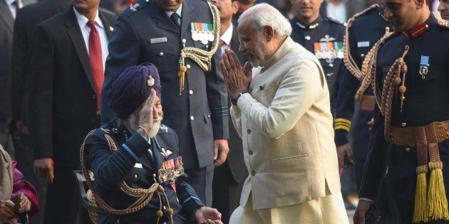 Prime Minister Narendra Modi greets Marshal of the Indian Air Force, Arjan Singh, during 'At Home' reception at President's House, on January 26, 2016 in New Delhi, India.