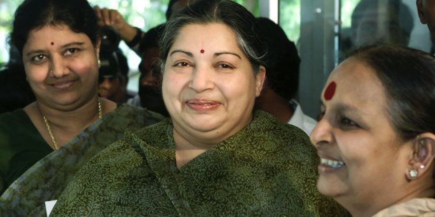 Jayalalitha (C) with Sasikala Natarajan (L) in 2001.