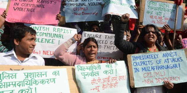 Supporters of the Communist Party of India (Marxist-Leninist) (CPI M-L) shout slogans during a demonstration against a gang rape in Muzaffarnagar, in New Delhi on December 6, 2013.