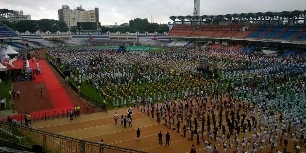 Thousands of people have taken part in Yoga day at Kanteerava Outdoor Stadium on June 21, 2015 in Bangalore, India.