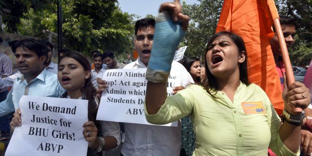 NEW DELHI, INDIA - SEPTEMBER 25: Akhil Bharatiya Vidyarthi Parishad (ABVP) activists protest against the lathicharge in BHU campus at HRD Ministry, Shastri Bhawan on September 25, 2017 in New Delhi, India. Several students, mostly women, and policemen were wounded in clashes at Banaras Hindu University after university guards and cops cane-charged protesters in front of the vice chancellor?s home and at the main entrance to the century-old institutions sprawling campus around midnight on Saturday. (Photo by Sonu Mehta/Hindustan Times via Getty Images)