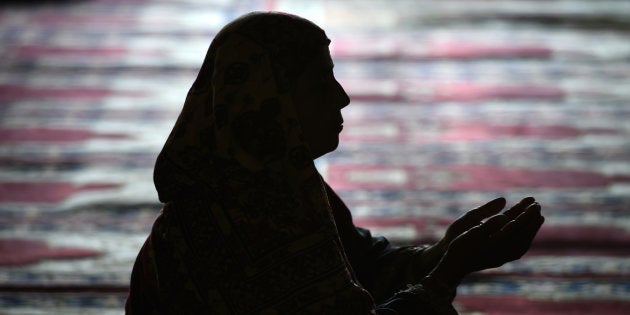 A Kashmiri resident prays inside Kashmir's main mosque Jamia Masjid during Ramadan in downtown Srinagar on June 15, 2017.Muslims around the world abstain from eating, drinking and conducting sexual relations from sunrise to sunset during Ramadan, the holiest month in the Islamic calendar. / AFP PHOTO / TAUSEEF MUSTAFA (Photo credit should read TAUSEEF MUSTAFA/AFP/Getty Images)