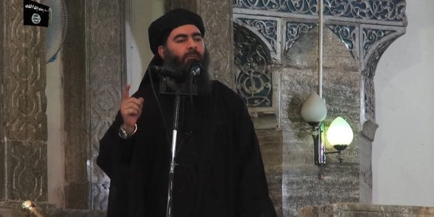 This July 5, 2014 photo shows an image grab taken from a propaganda video released by al-Furqan Media allegedly showing the leader of the Islamic State (IS) jihadist group, Abu Bakr al-Baghdadi, aka Caliph Ibrahim, adressing Muslim worshippers at a mosque in the militant-held northern Iraqi city of Mosul.