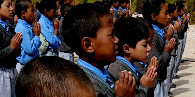 School children attend their morning assembly inside a charity school in Leh district of Buddhist dominated Ladakh region in the Indian state of Jammu and Kashmir.