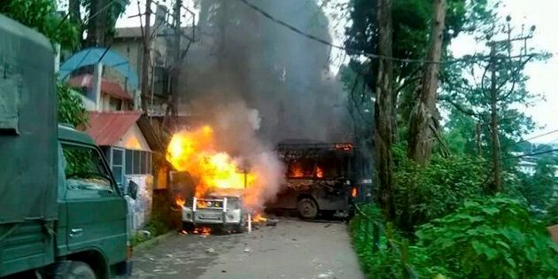 Police Vehicles in flames after being torched by Gorkha Janmukti Morcha (GJM) supporters in Darjeeling on Thursday.