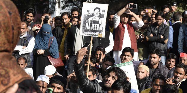 JNU students with people from different organisations, during a protest march and dharna against Delhi Police over missing JNU student Najeeb Ahmed at Jantar Mantar, on December 14, 2016.
