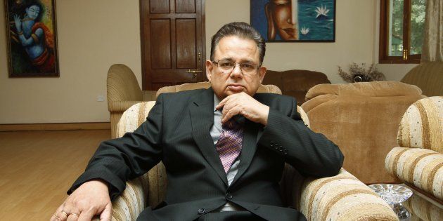 Justice Dalveer Bhandari poses at his residence during an iInterview on May 13, 2012 in New Delhi, India.