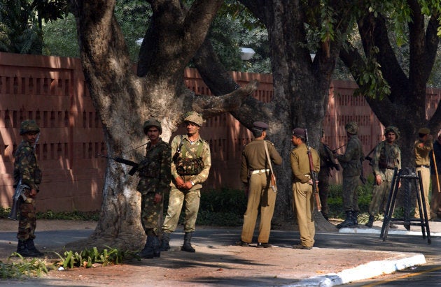 Indian military and police stand guard outside the Indian parliament building December 13, 2001 in New Delhi, India.