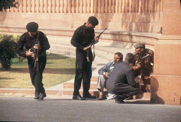 Security personnel take position at the Parliament.