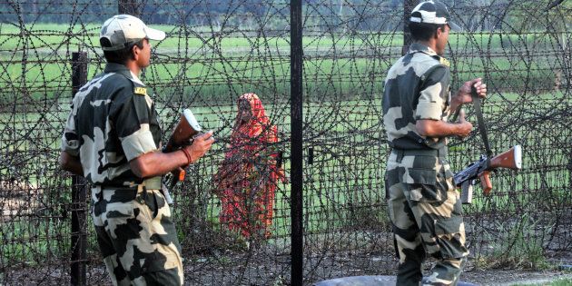 Indian Border Security Force (BSF) soldiers patrolling at the near Petrapole Border outpost at the India-Bangladesh Border on the outskirts of Kolkata.