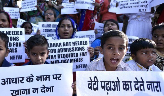 Children from government school protest at Shastri Bhawan against making Aadhar card mandatory for mid-day meal on March 17, 2017 in New Delhi, India.