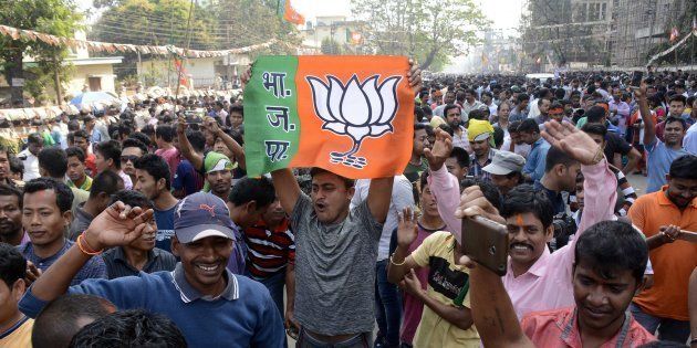 Indian supporters of the Bharatiya Janata Party (BJP) celebrates at a rally as voting was underway for the Tripura legislative assembly election in Agartala, the capital of the northeastern state of Tripura, on March 3, 2018.