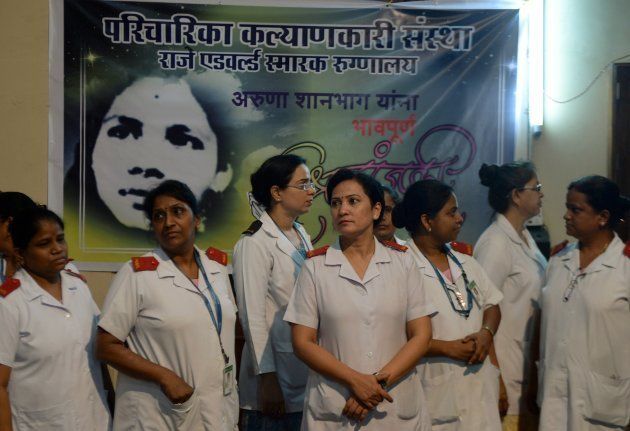 Indian nurses gather to pay their respect for nurse Aruna Shanbaug at a hospital in Mumbai on May 18, 2015. Shanbaug died on May 18 after 42 years in a coma following a brutal rape, in a case that led India to ease some restrictions on euthanasia.