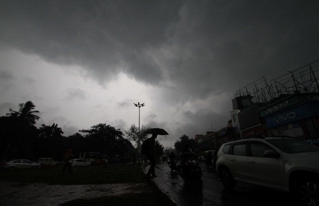 Rain clouds hover in the sky before downpour in the eastern Indian state Odisha's capital city Bhubaneswar on 13 September 2017. (Photo by STR/NurPhoto via Getty Images)