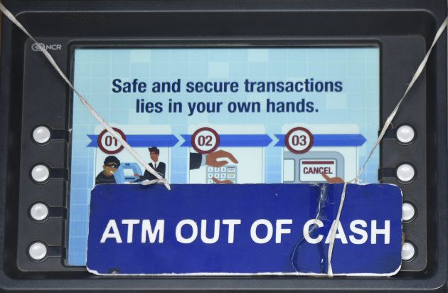NEW DELHI, INDIA - APRIL 17: An ATM with a sign board showing no cash at Bengali Market, near Mandi House, on April 17, 2018 in New Delhi, India. Reports of a cash crunch in several states including Delhi, UP, MP, Bihar Telangana and Gujarat sent the central government scrambling to put together a contingency plan and allay fears. Finance Minister Arun Jaitley called it a temporary shortage, adding that there was more than adequate currency in circulation. He blamed the crisis on a sudden spurt in demand and assured that the situation was being tackled. (Photo by Vipin Kumar/Hindustan Times via Getty Images)