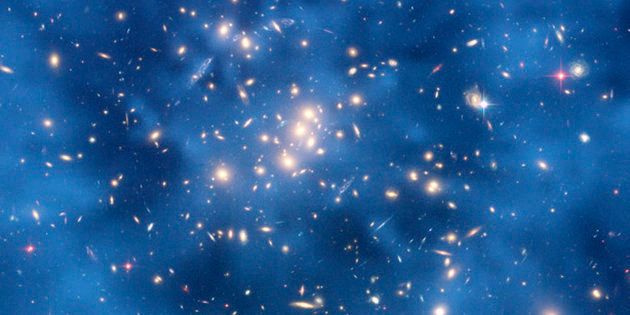 This undated image from the Hubble Space Telescope shows a ghostly ring of dark matter in a galaxy cluster designated Cl 0024+17.